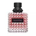Valentino perfume bottle with black cap on a white background
